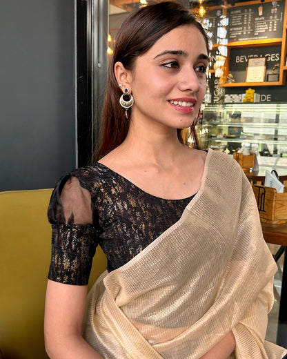 Model pairing the blouse with a saree for a stylish, festive look