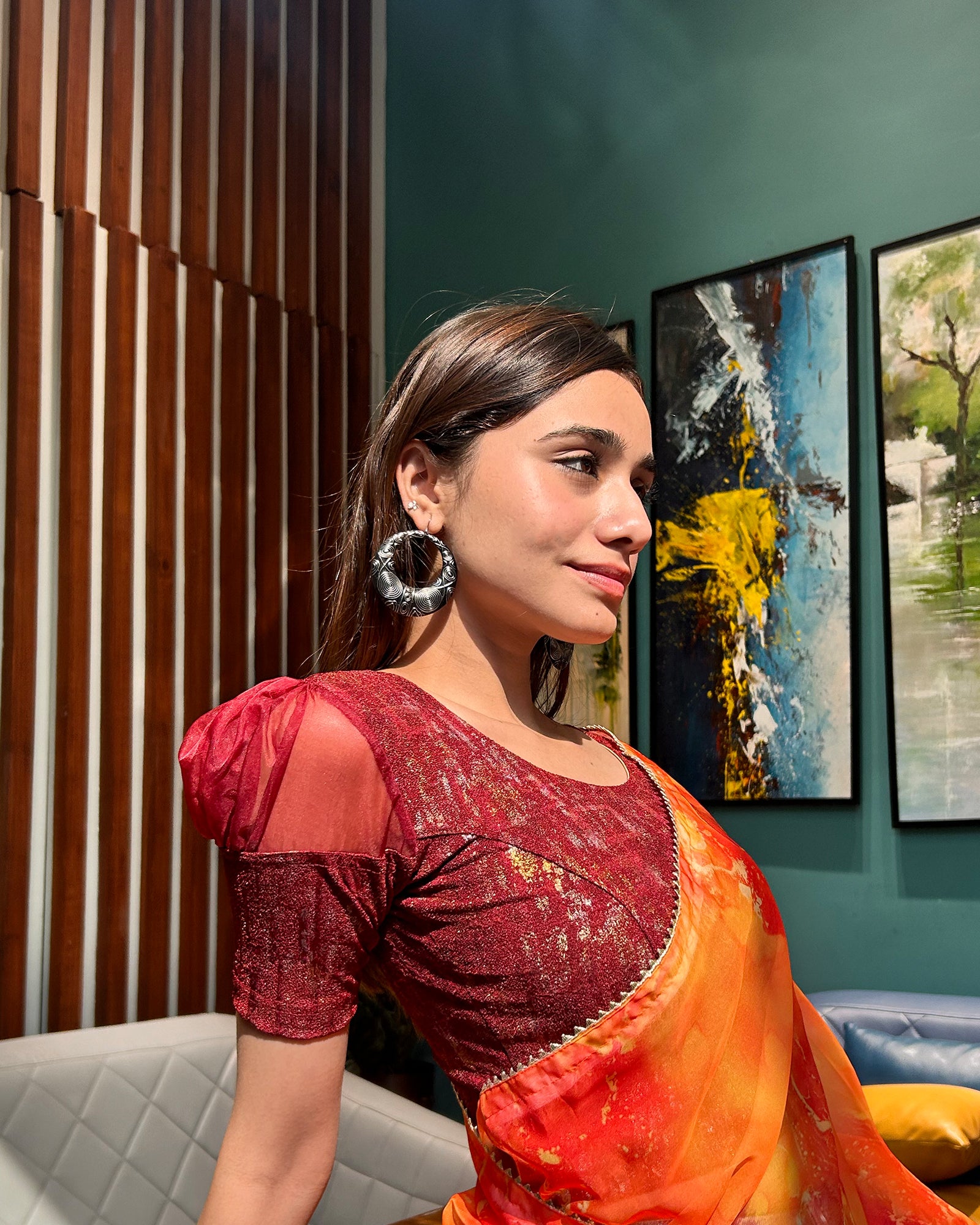 Model pairing the blouse with a saree for a stylish, festive look