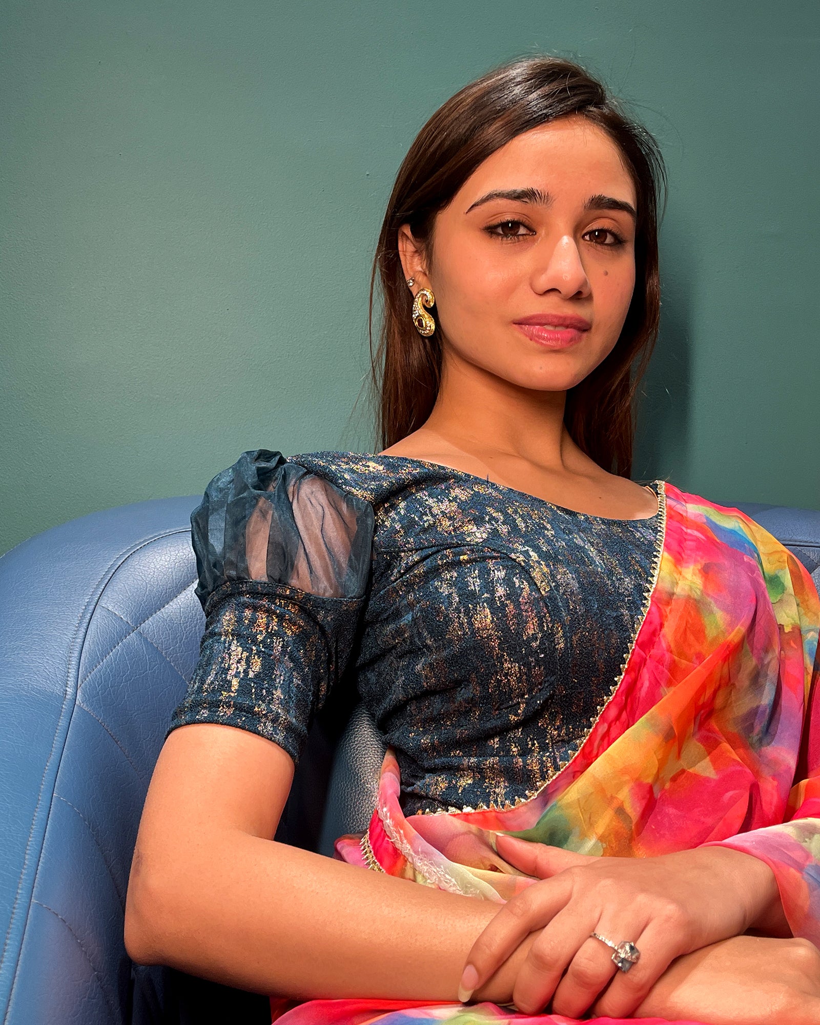 Model pairing the blouse with a saree for a stylish, festive look