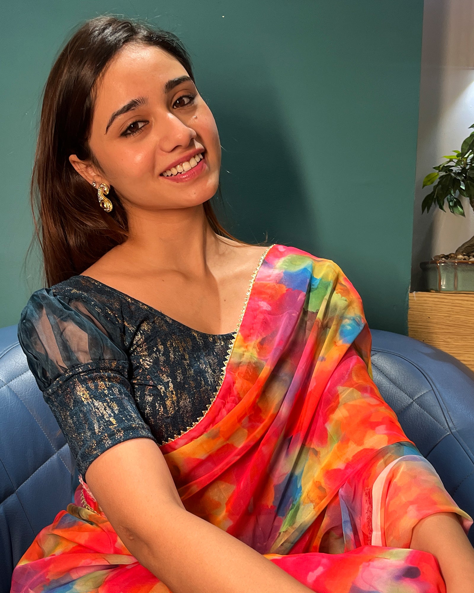 Model pairing the blouse with a saree for a stylish, festive look