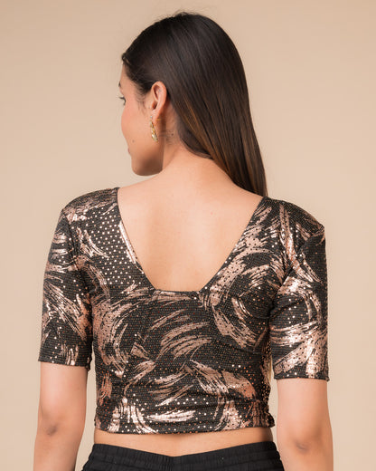 Rear view of the black sequin stretchable blouse showcasing the deep round back design.
