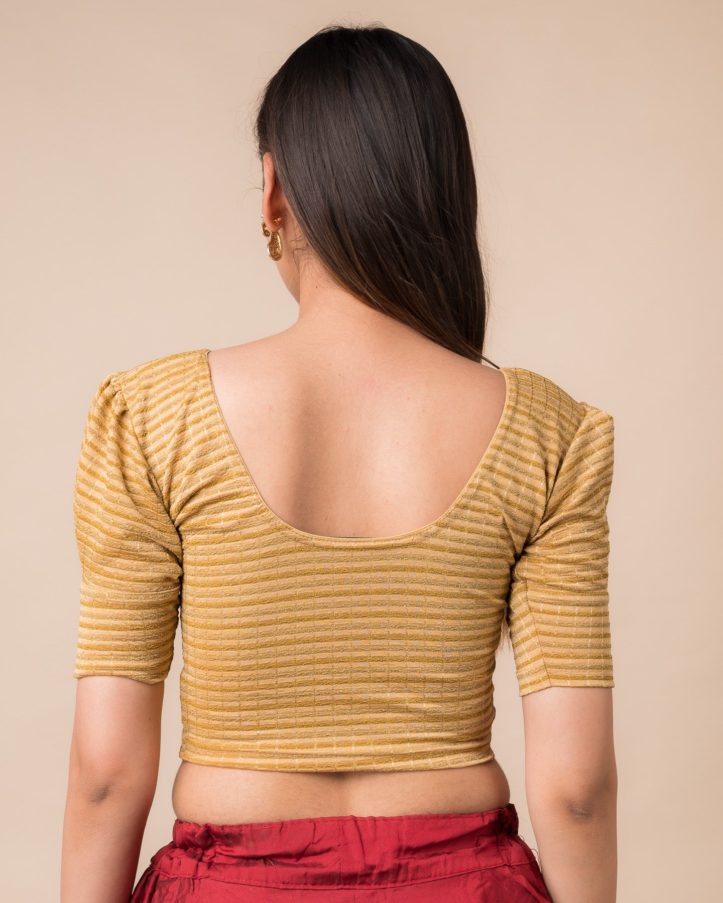 Rear view of the zari single-stripe stretchable blouse showcasing the back design.