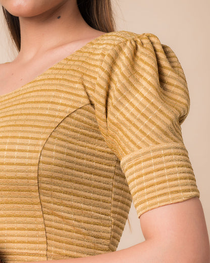  Close-up of the zari single-stripe fabric detailing the texture and stretchability of the readymade blouse.