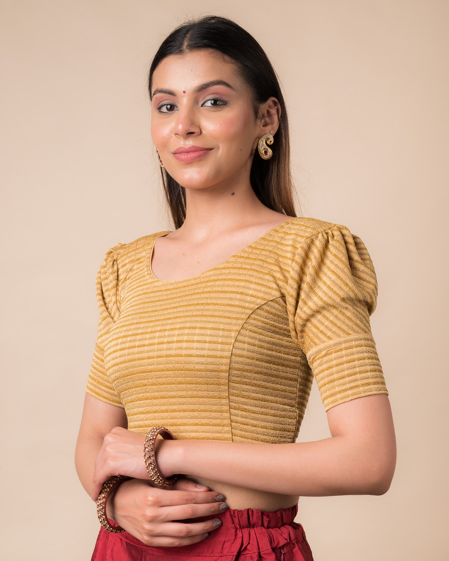 Side profile of the zari single-stripe stretchable blouse highlighting the fit and sleeve style.