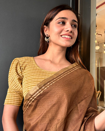 Model pairing the zari single-stripe stretchable blouse with a traditional saree, demonstrating a complete ethnic look.
