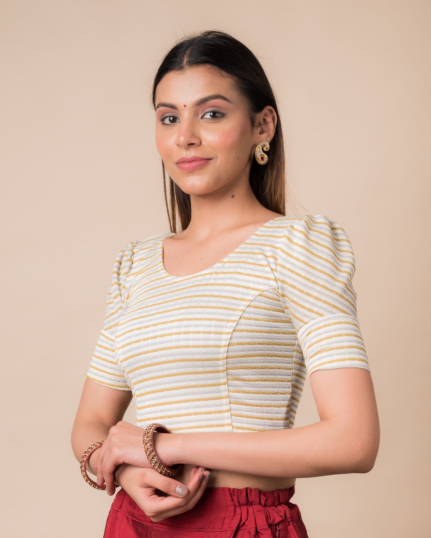 Side profile of the zari single-stripe stretchable blouse highlighting the fit and sleeve style.
