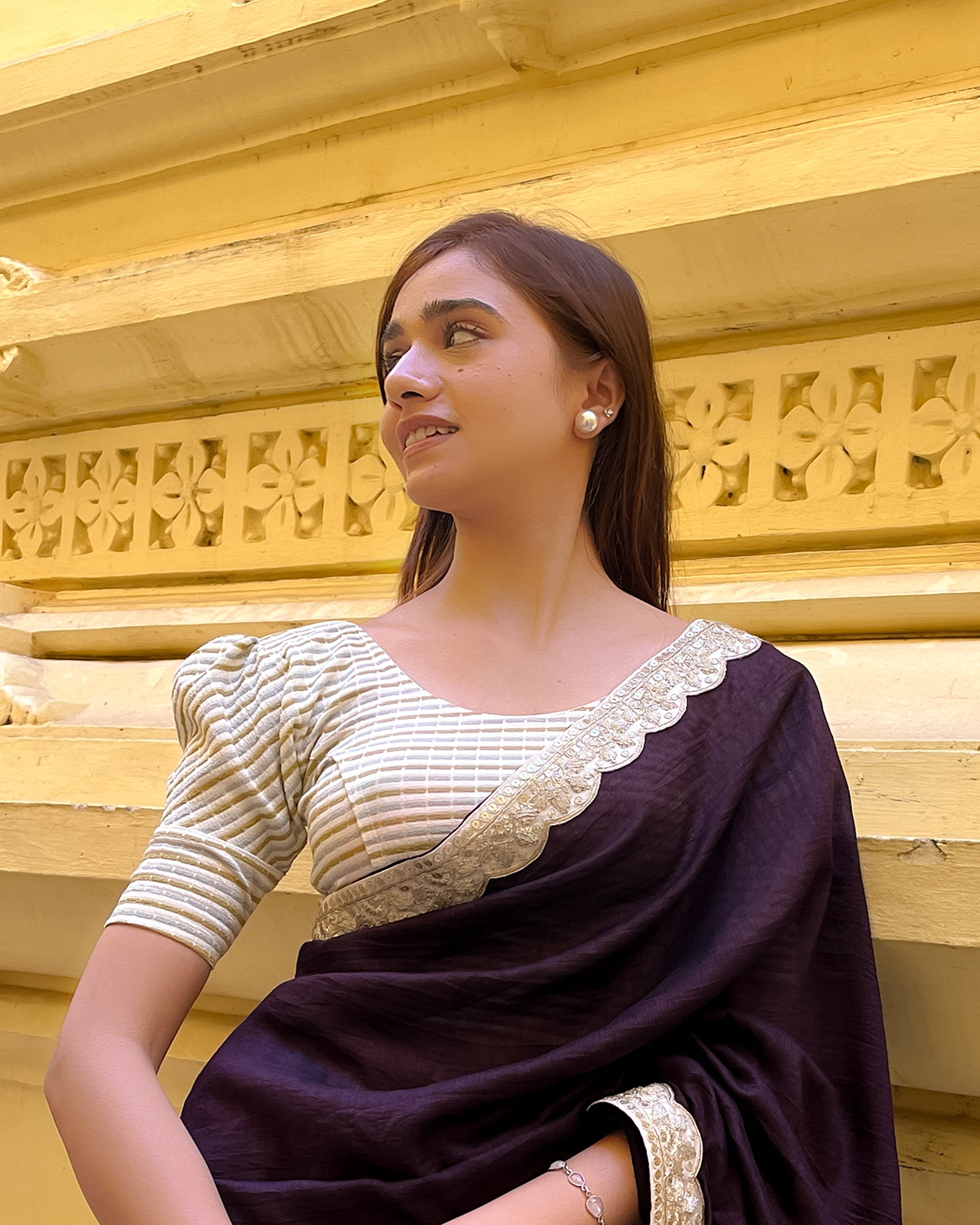 Model pairing the zari single-stripe stretchable blouse with a traditional saree, demonstrating a complete ethnic look.