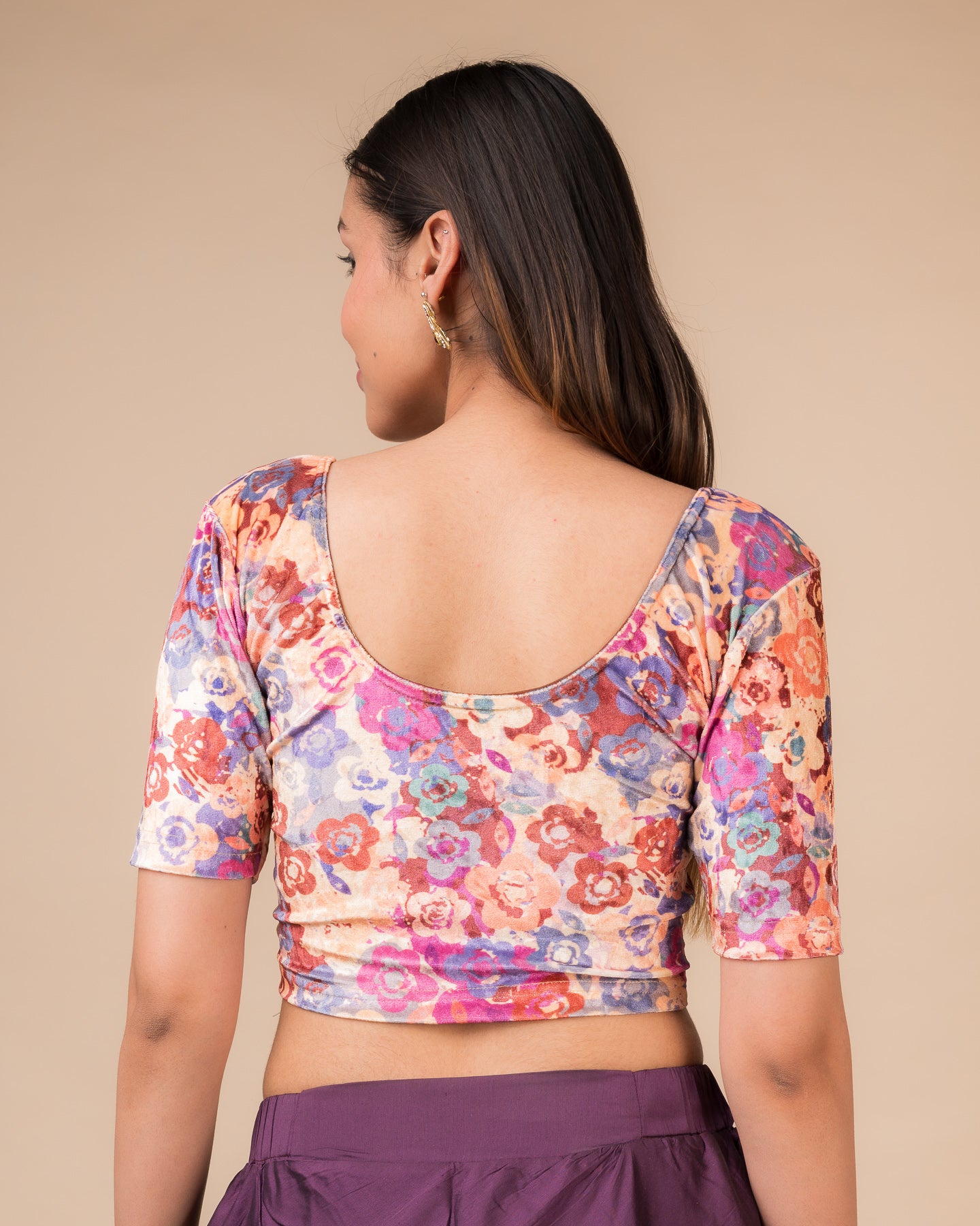 Rear view of the floral velvet stretchable blouse showcasing the back design.