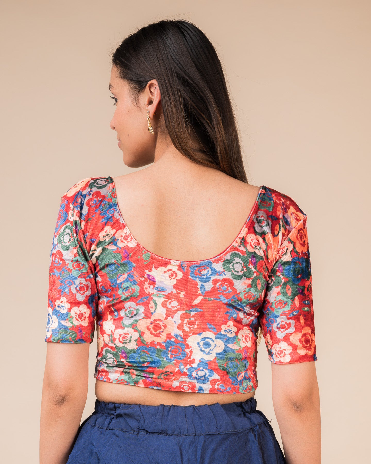  Rear view of the floral velvet stretchable blouse showcasing the back design.