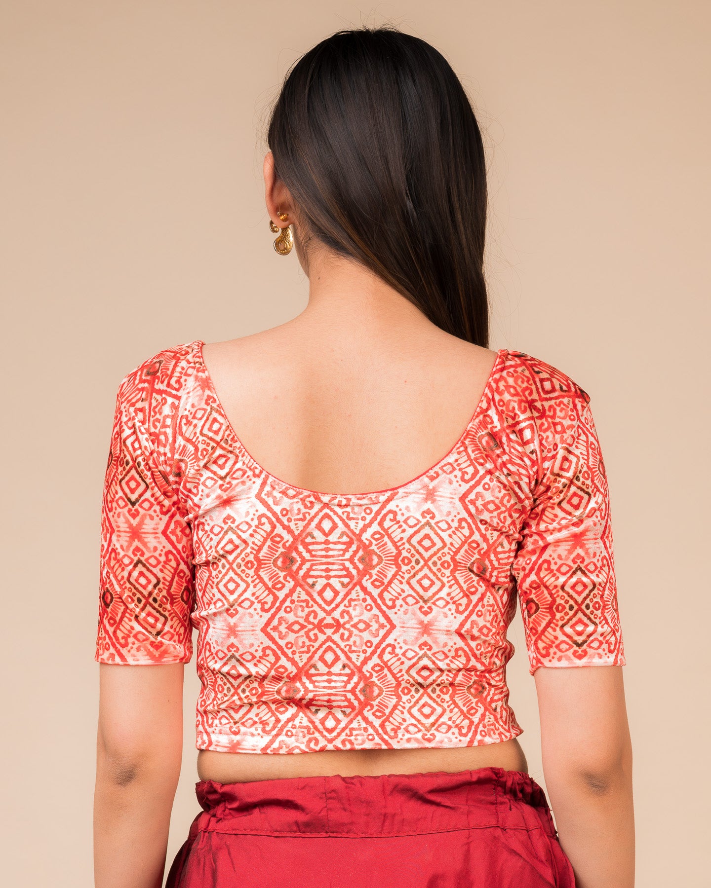 Rear view of the velvet stretchable blouse showcasing the back design and geometric pattern.