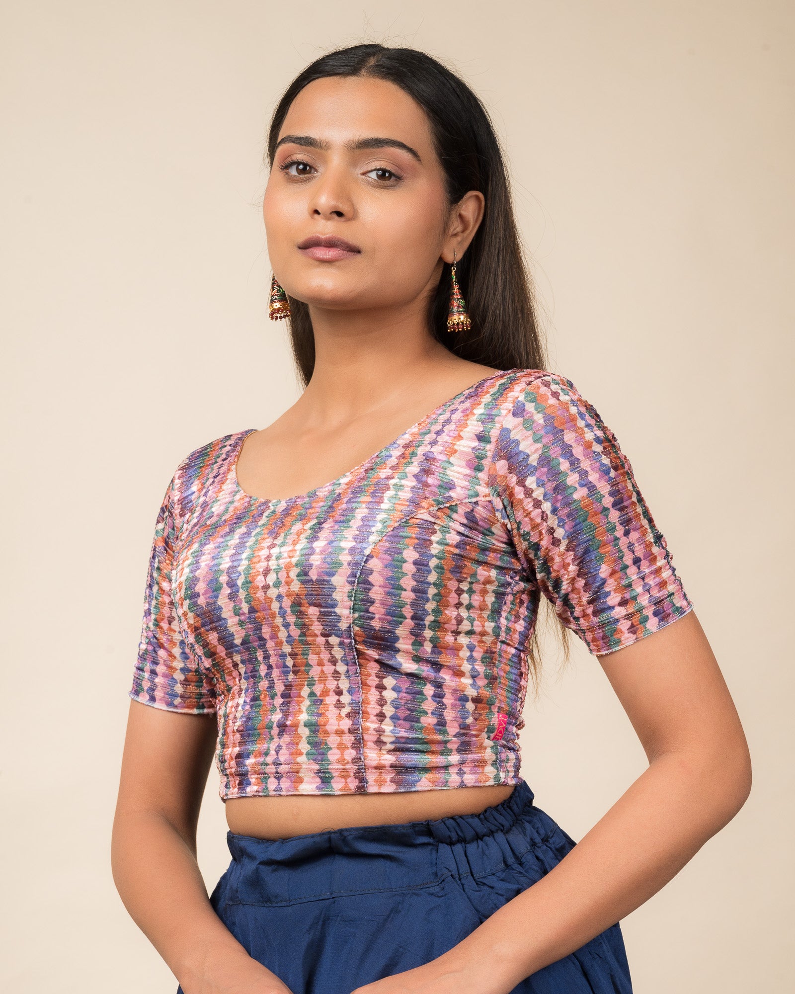 Side profile of the velvet stretchable blouse highlighting the fit and sleeve length.