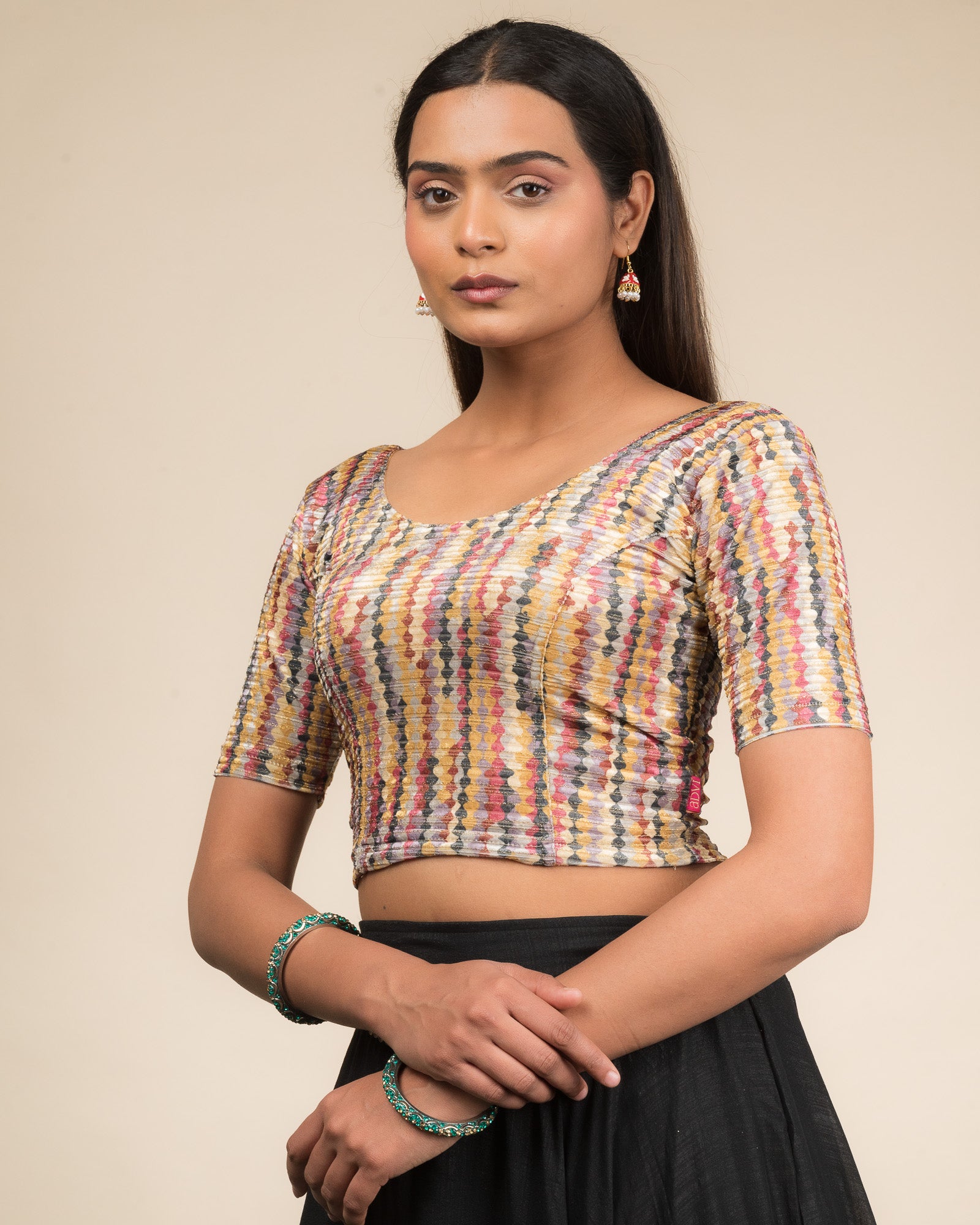 Side profile of the velvet stretchable blouse highlighting the fit and sleeve length.