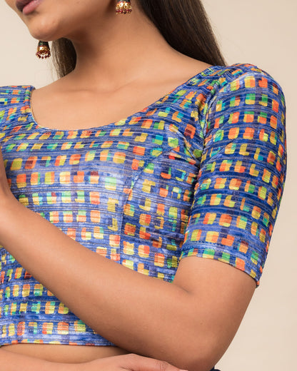 Close-up of the velvet fabric detailing the texture and abstract print of the readymade blouse.