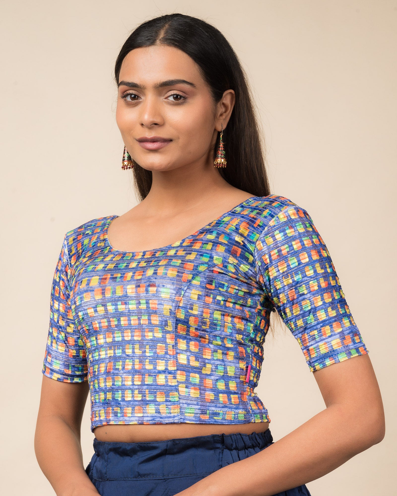 Side profile of the velvet stretchable blouse highlighting the fit and sleeve length.