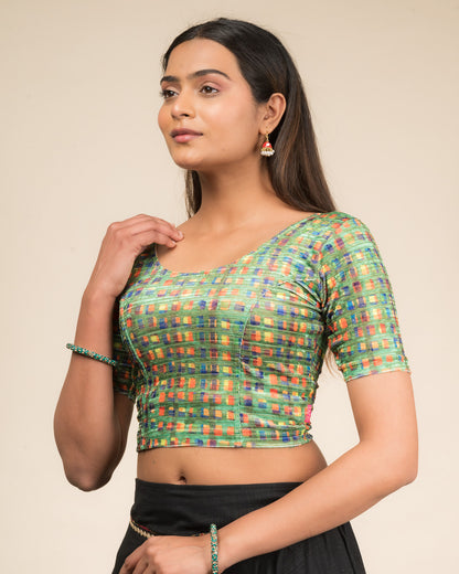 Side profile of the velvet stretchable blouse highlighting the fit and sleeve length.