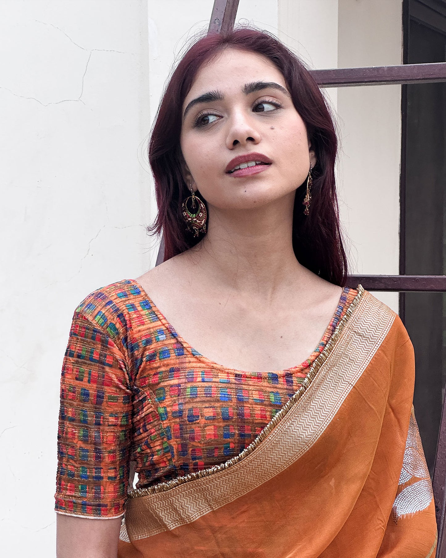 Model pairing the velvet stretchable blouse with a traditional saree, demonstrating a complete ethnic look.