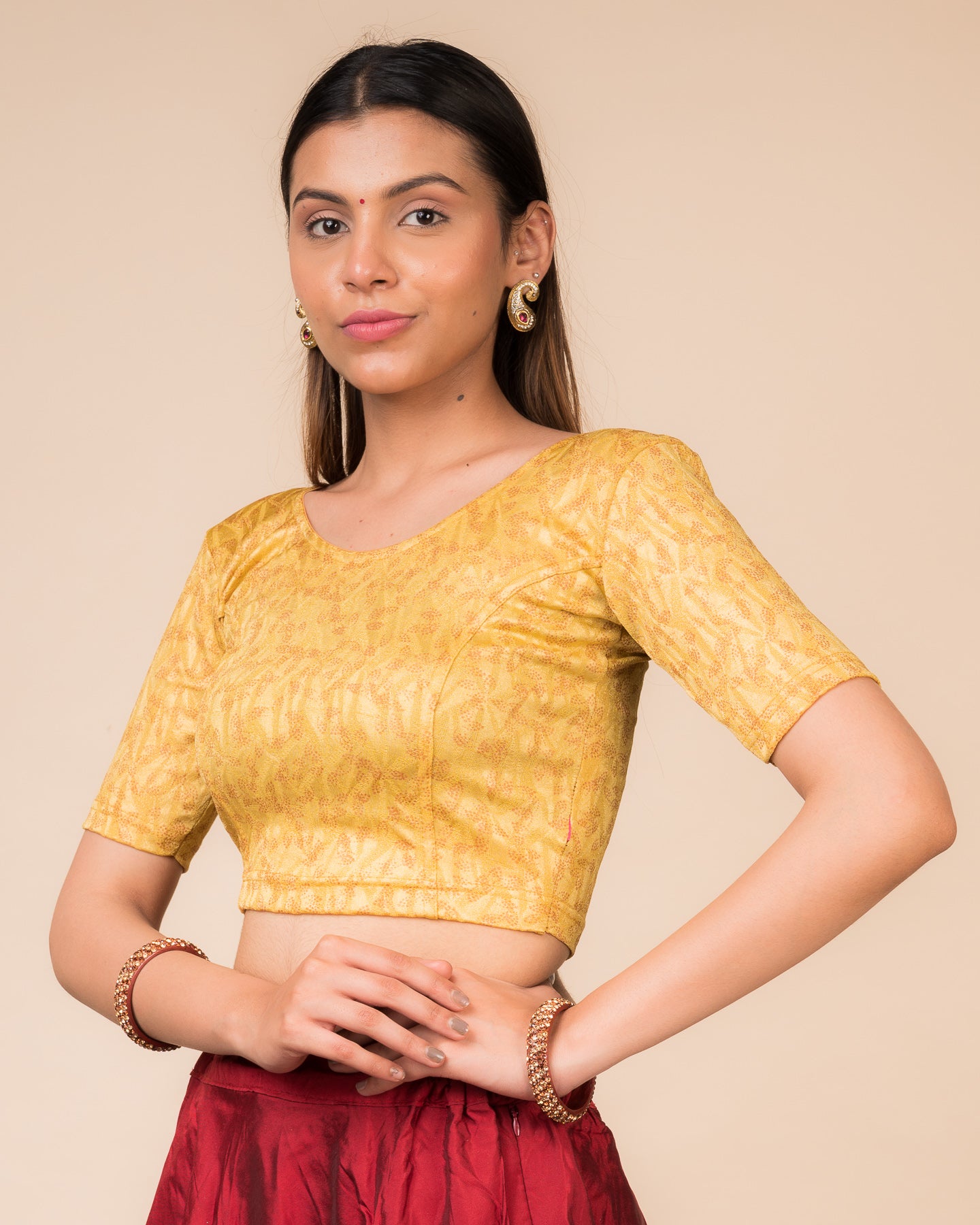 Side profile of the textured stretchable blouse highlighting the fit and sleeve length.