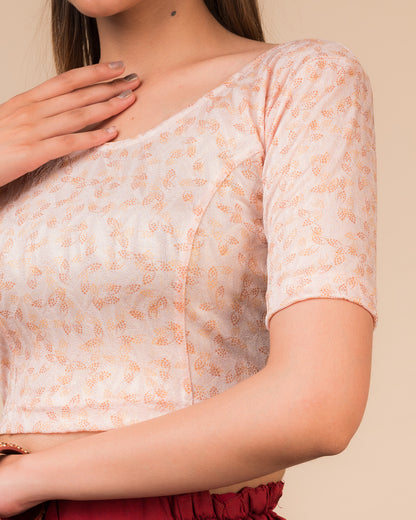Close-up of the textured fabric detailing the texture and stretchability of the readymade blouse.