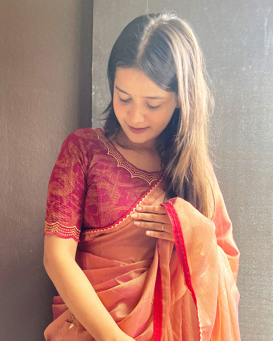 Model pairing the maroon-colored stretchable blouse with a traditional saree, demonstrating a complete ethnic look.