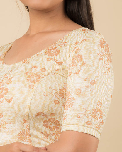 Close-up of the jacquard fabric detailing the self-design pattern and stretchability of the readymade blouse.