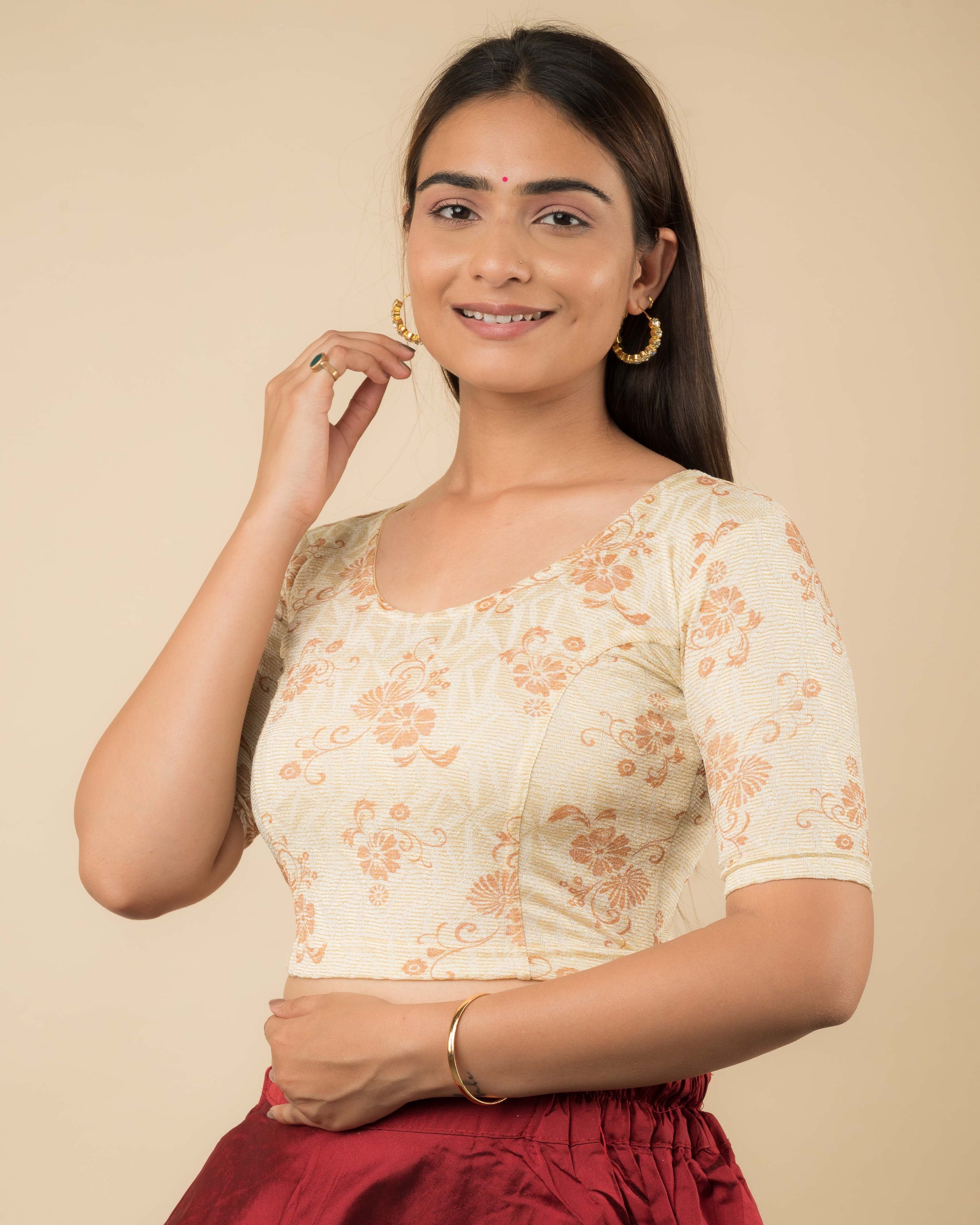 Side profile of the jacquard stretchable blouse highlighting the fit and sleeve length.