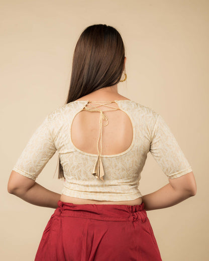 Rear view of the jacquard stretchable blouse showcasing the dori tie-up with tassels.