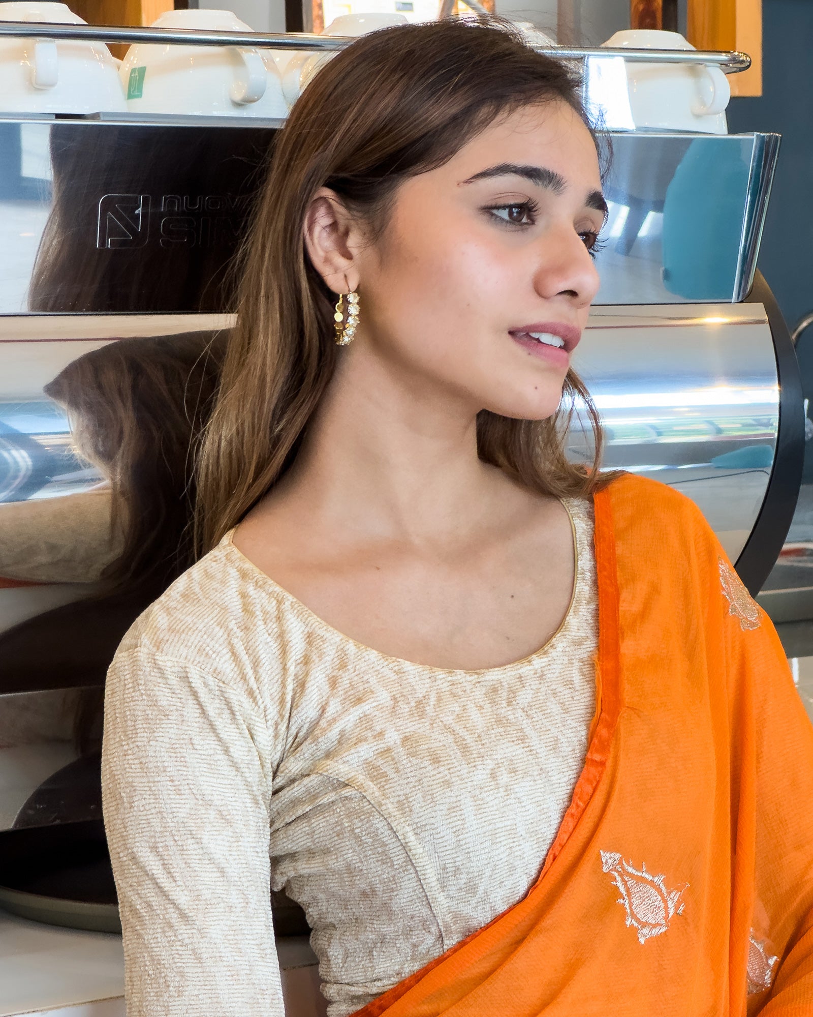 Model pairing the jacquard stretchable blouse with a traditional saree, demonstrating a complete ethnic look.