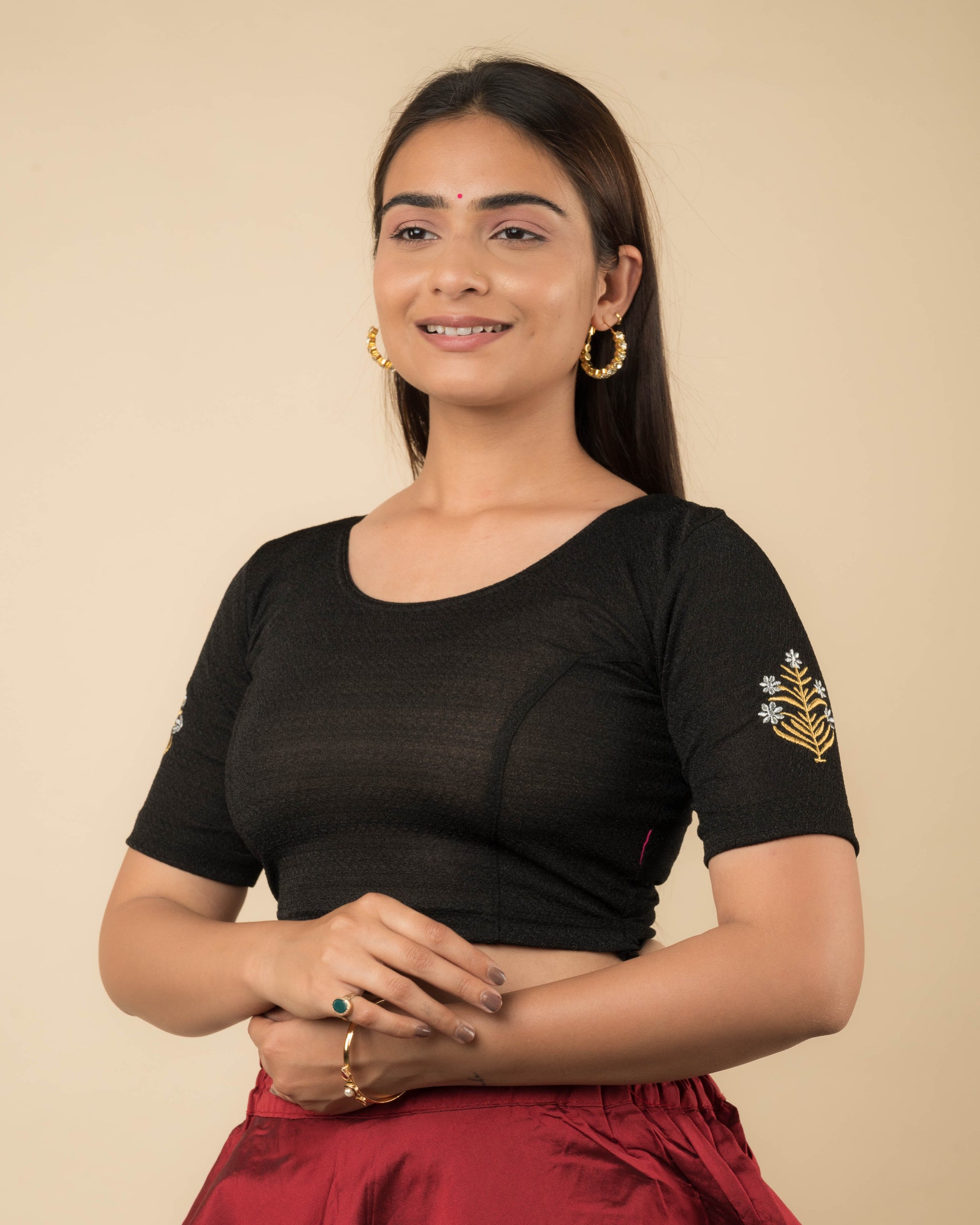 Side profile of the buti embroidered stretchable blouse highlighting the fit and sleeve length.