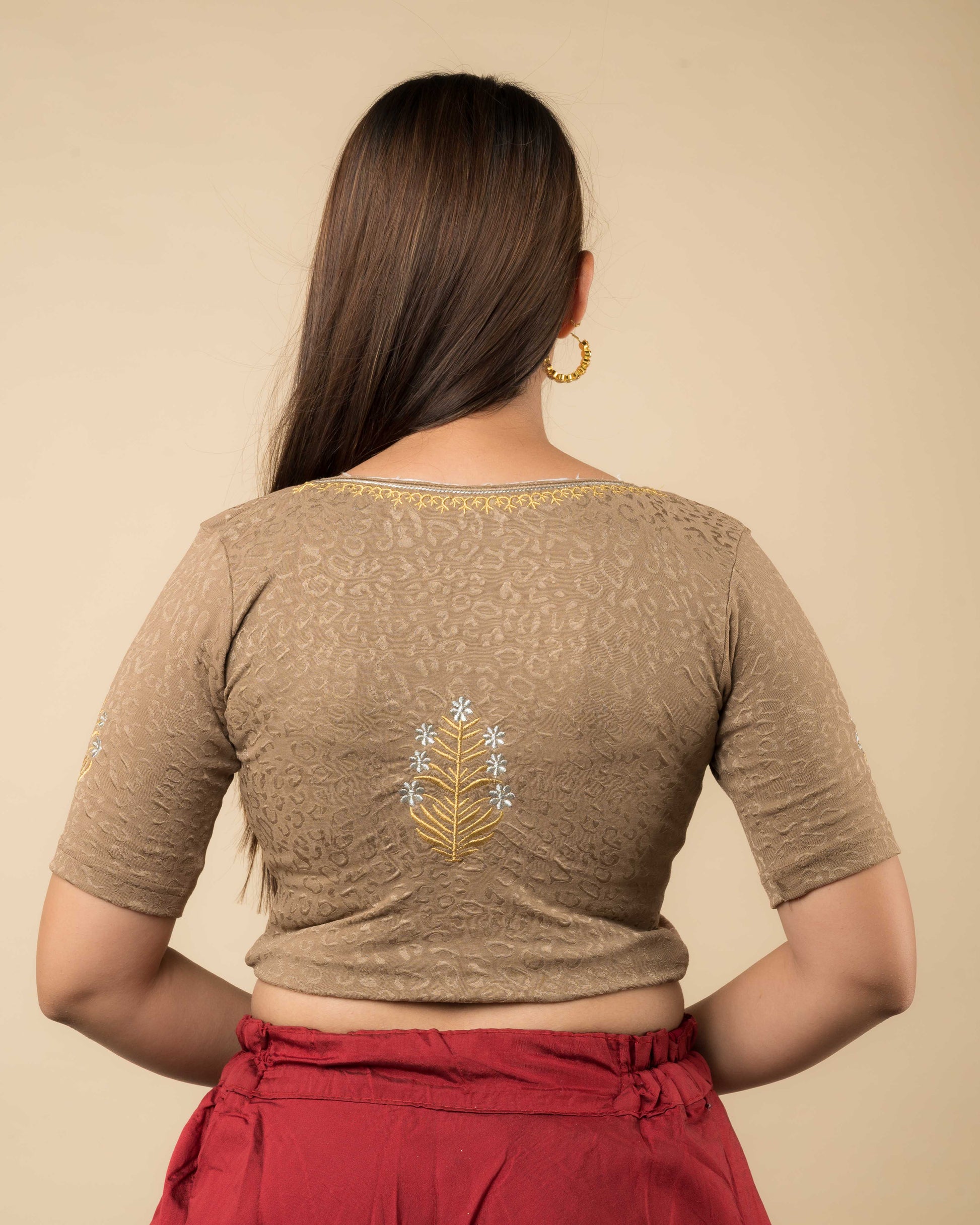 Rear view of the buti embroidered stretchable blouse showcasing the back design.