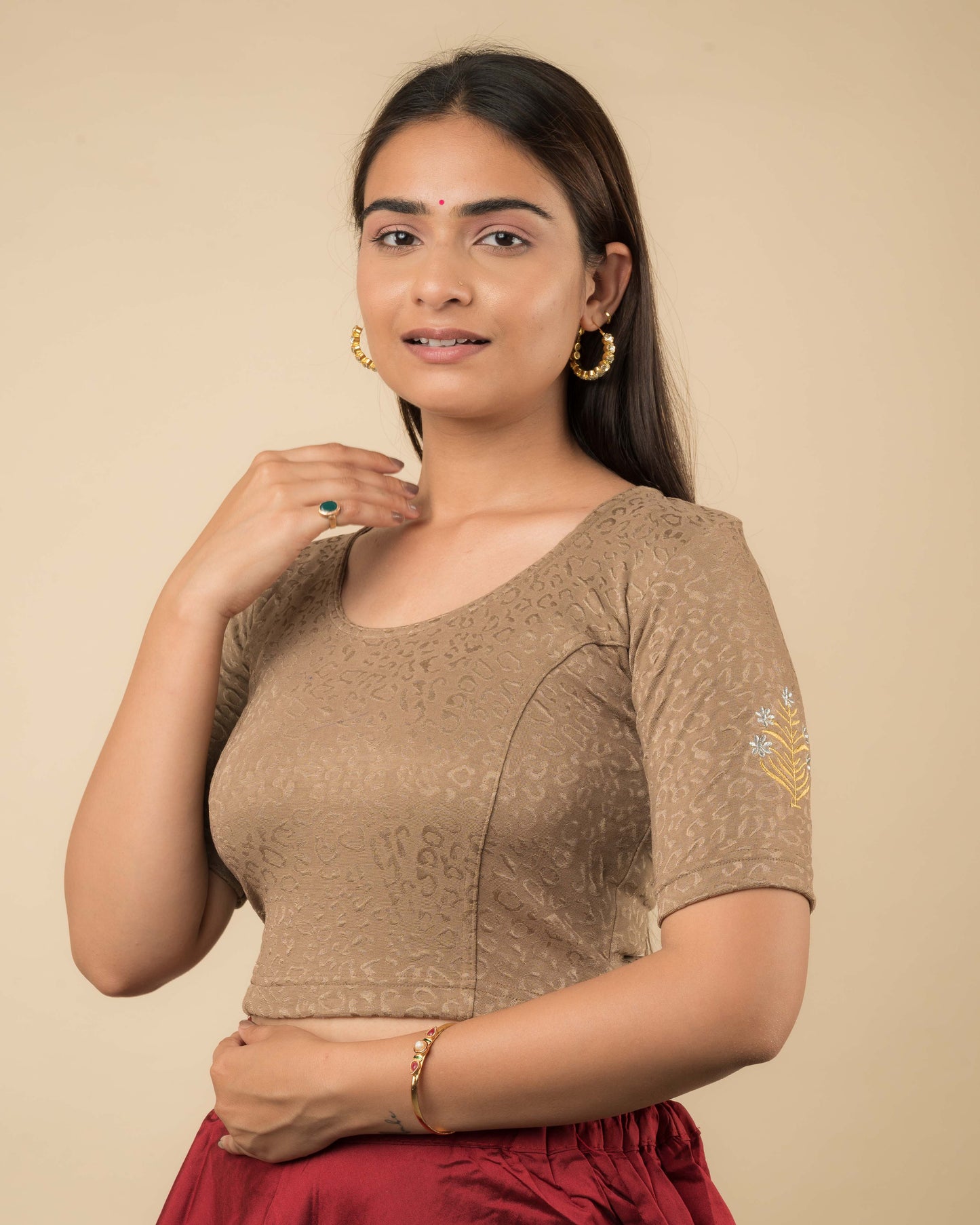Side profile of the buti embroidered stretchable blouse highlighting the fit and sleeve length.