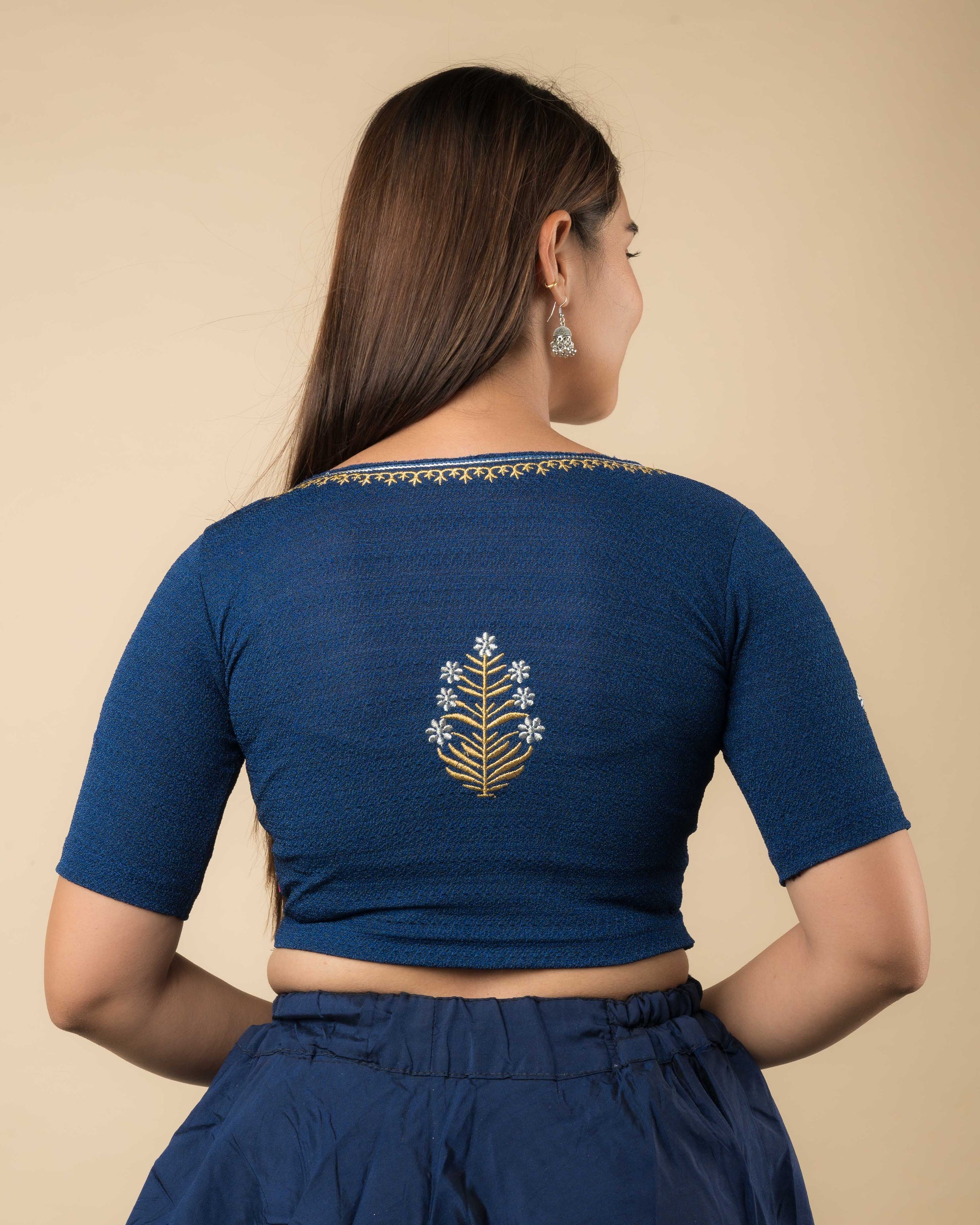 Rear view of the buti embroidered stretchable blouse showcasing the back design.