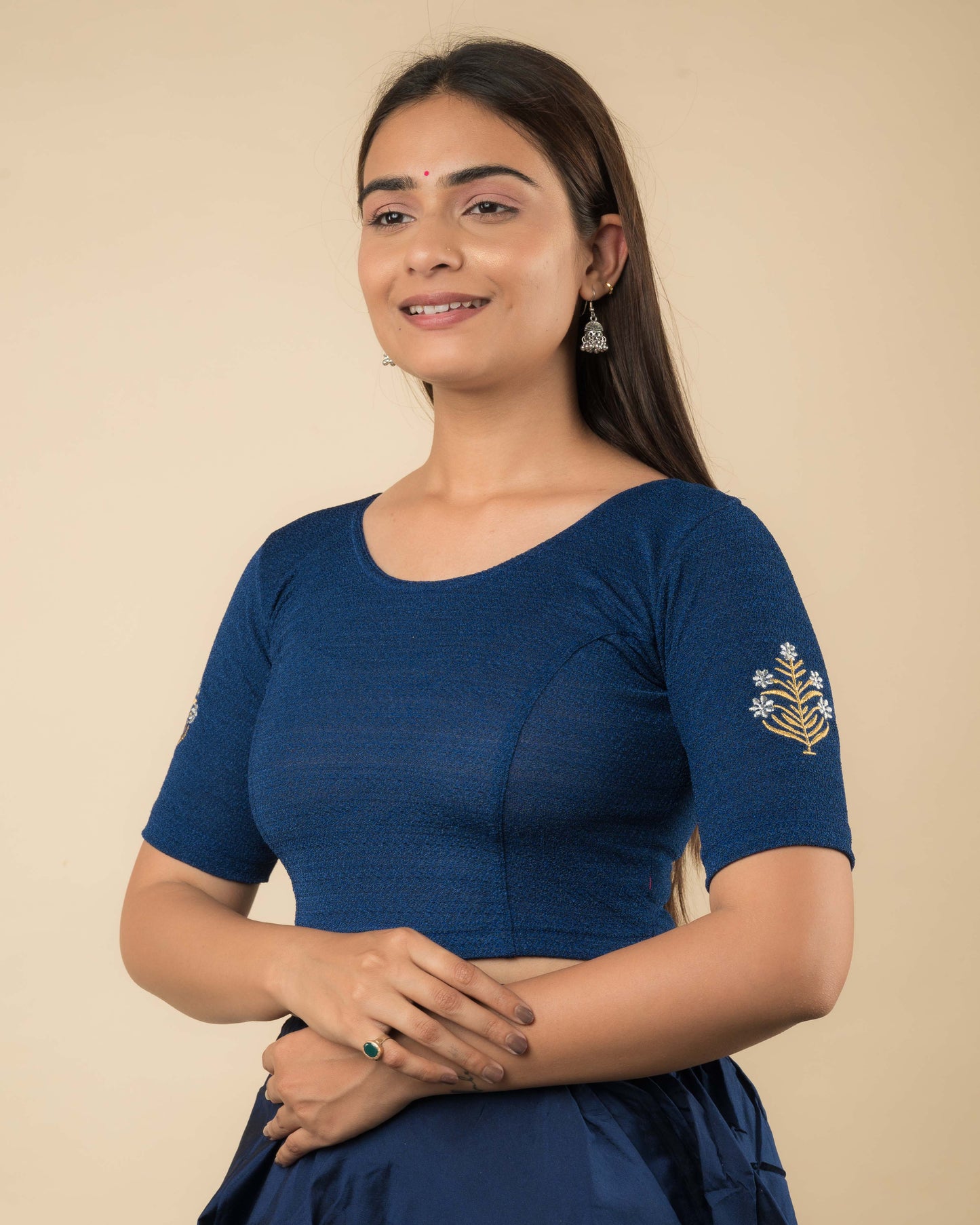 Side profile of the buti embroidered stretchable blouse highlighting the fit and sleeve length.