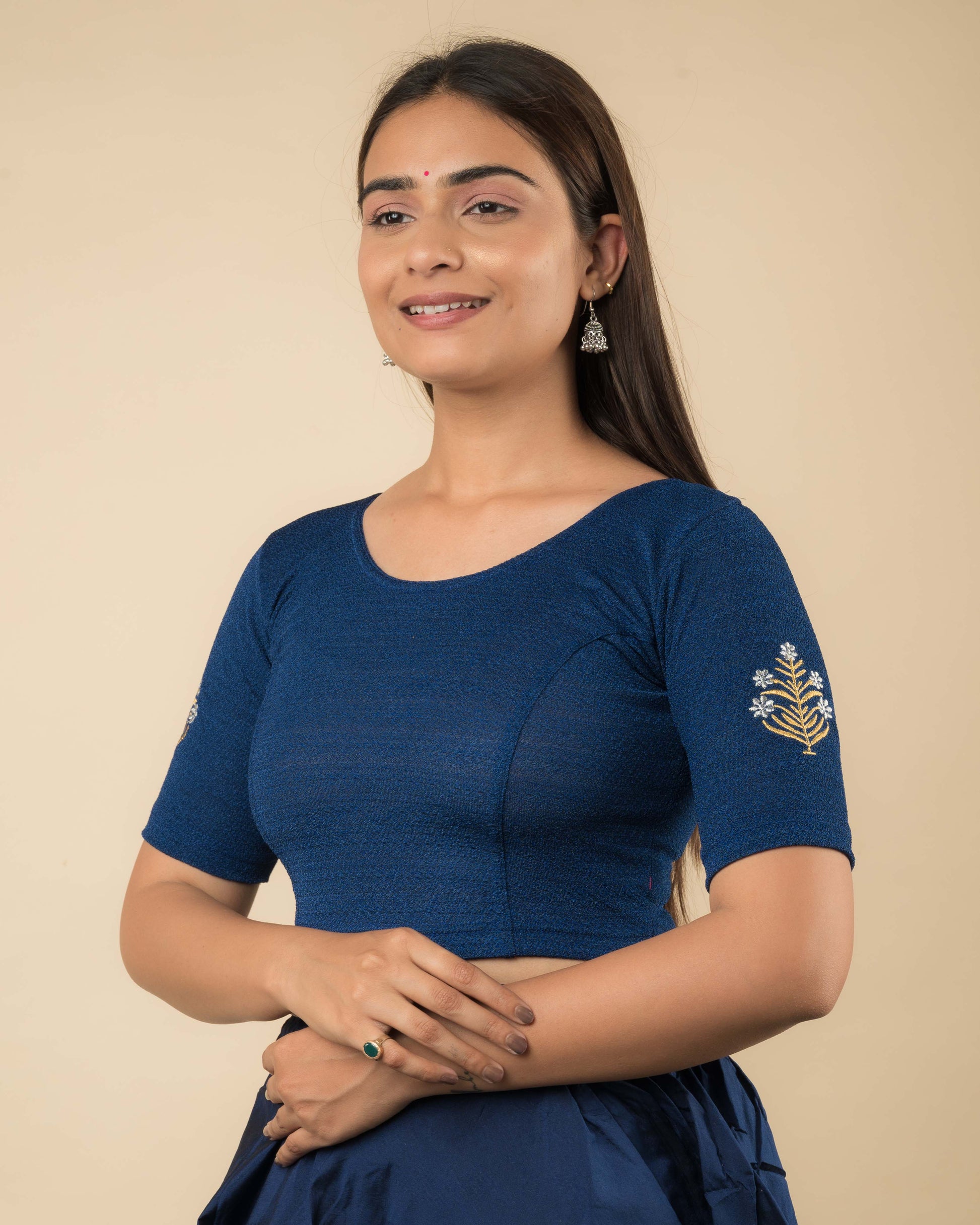Side profile of the buti embroidered stretchable blouse highlighting the fit and sleeve length.
