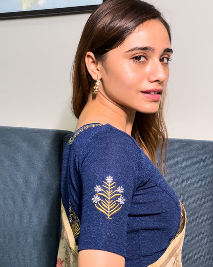 Model pairing the buti embroidered stretchable blouse with a traditional saree, demonstrating a complete ethnic look.