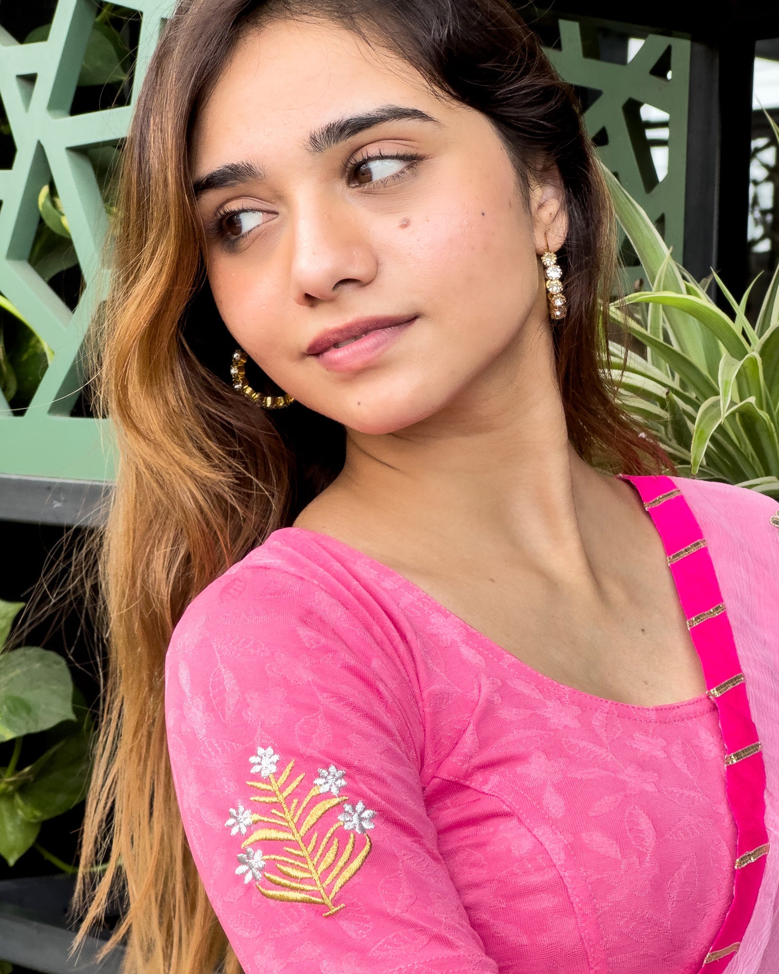 Model pairing the buti embroidered stretchable blouse with a traditional saree, demonstrating a complete ethnic look.