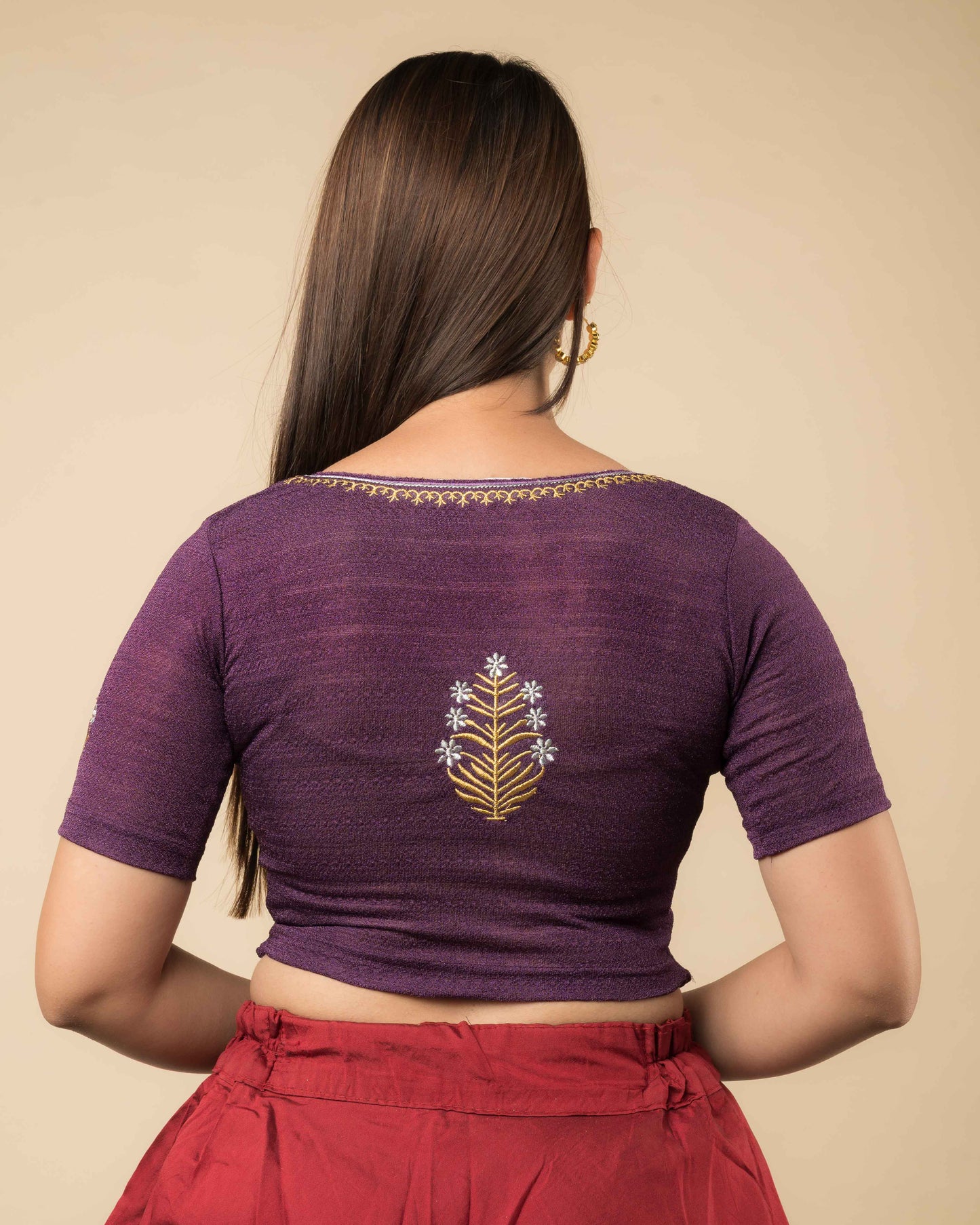 Rear view of the buti embroidered stretchable blouse showcasing the back design.
