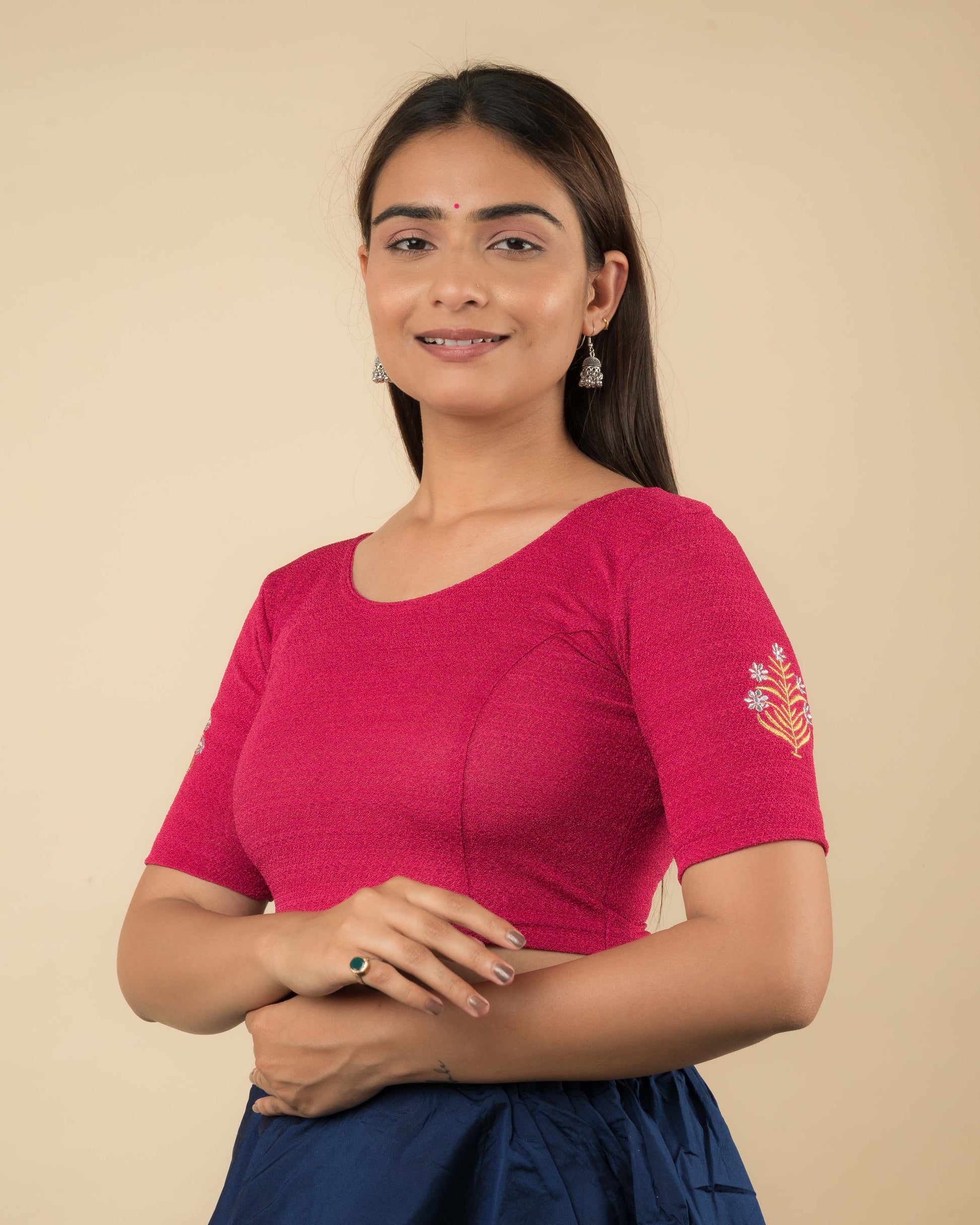 Side profile of the buti embroidered stretchable blouse highlighting the fit and sleeve length.
