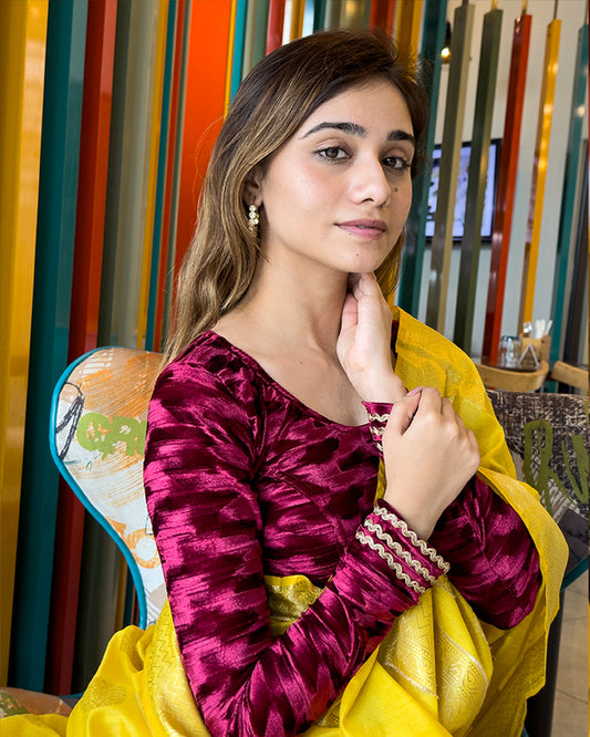 Model pairing the velvet stretchable blouse with a traditiona