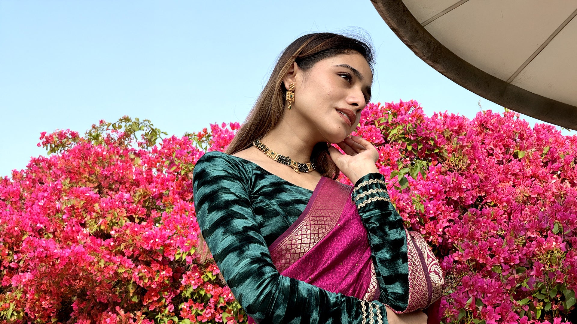 Model pairing the velvet stretchable blouse with a traditional saree, demonstrating a complete ethnic look.