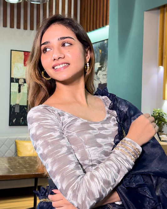 Model pairing the velvet stretchable blouse with a traditional saree, demonstrating a complete ethnic look.