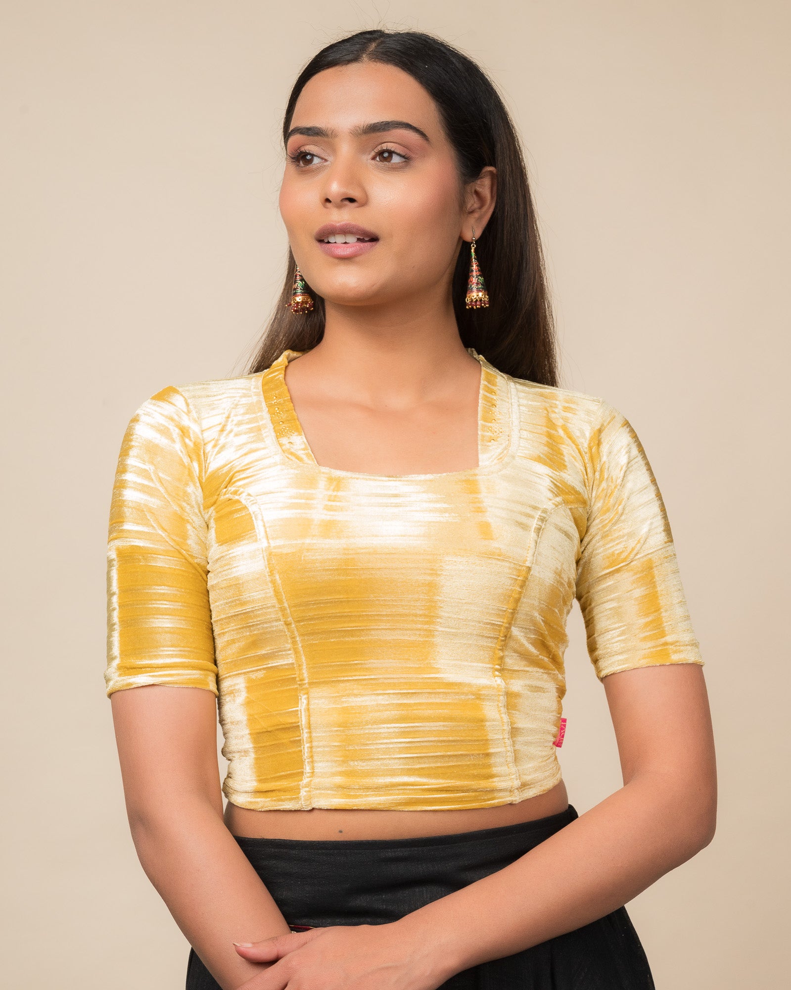 Model pairing the velvet stretchable blouse with a traditional saree, demonstrating a complete ethnic look.