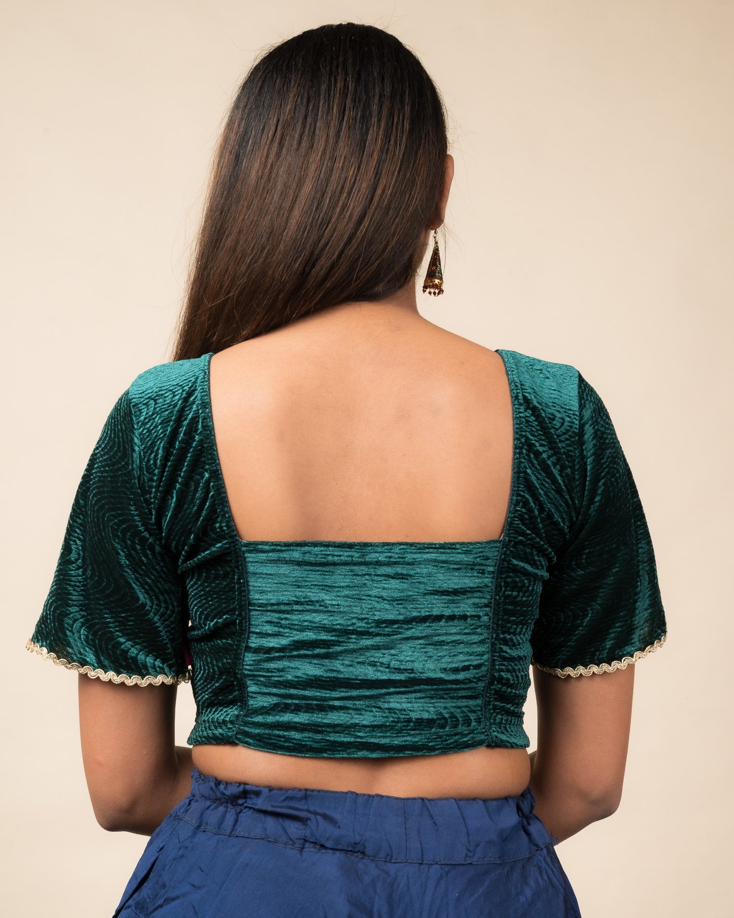 Rear view of the velvet stretchable blouse showcasing the back design.