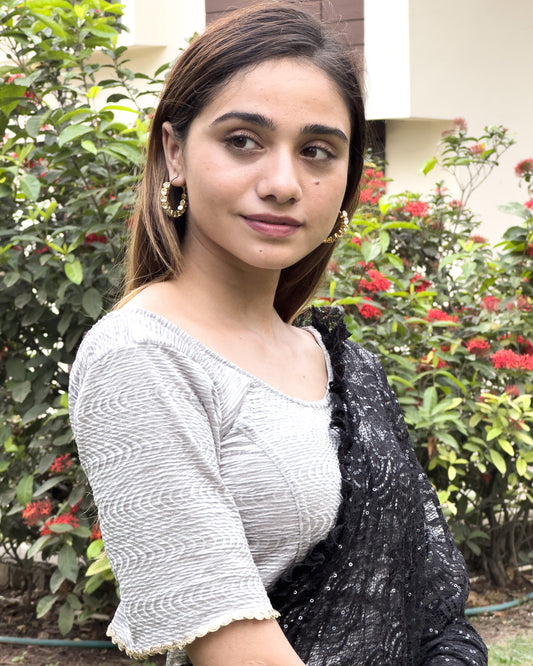 Model pairing the velvet stretchable blouse with a traditional saree, demonstrating a complete ethnic look.