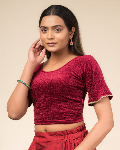 Side profile of the velvet stretchable blouse highlighting the fit and sleeve length.