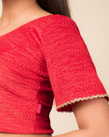 Close-up of the velvet fabric detailing the lace embroidery and stretchability of the readymade blouse.