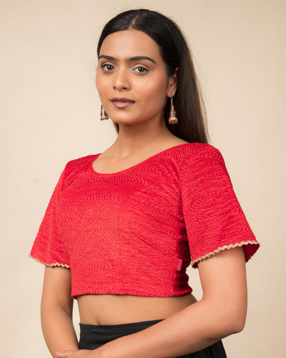 Side profile of the velvet stretchable blouse highlighting the fit and sleeve length.