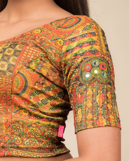Close-up of the jacquard knit fabric with mirror and printed detailing.