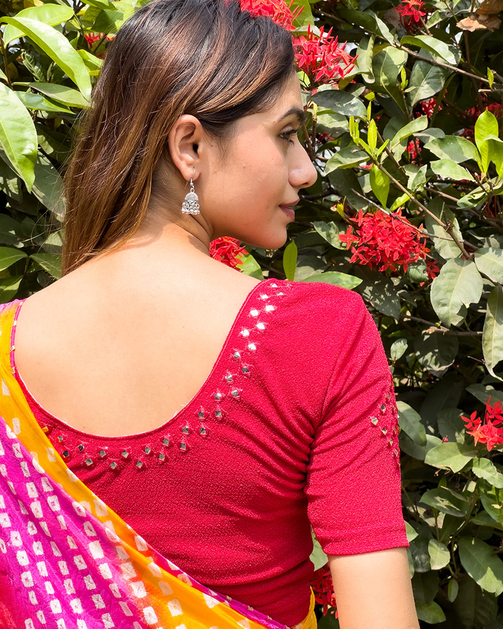 Rear view of the blouse showcasing the back design.