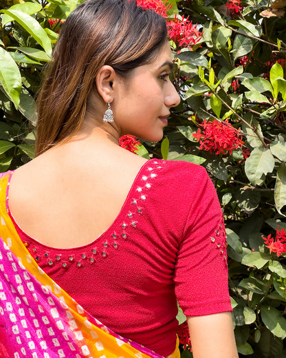 Rear view of the blouse showcasing the back design.