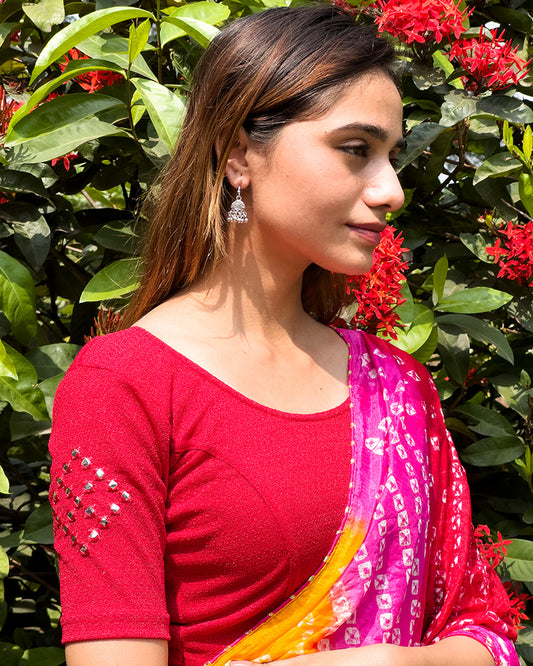 Model wearing the blouse with a saree for a festive ensemble ideal for Navratri.